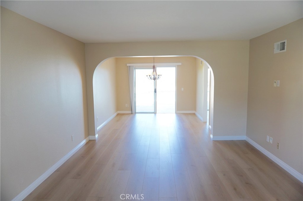 19584 Shadow Glen Circle Porter Ranch, CA 91326 - Photo 5 of 72 a view of a hallway with wooden floor