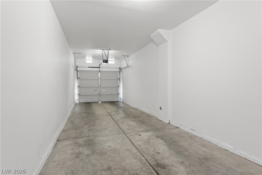 10550 West Alexander Road, Unit 1025 Las Vegas, NV 89129 - Photo 23 of 42 A spacious, pristine garage offers ample storage and direct access.