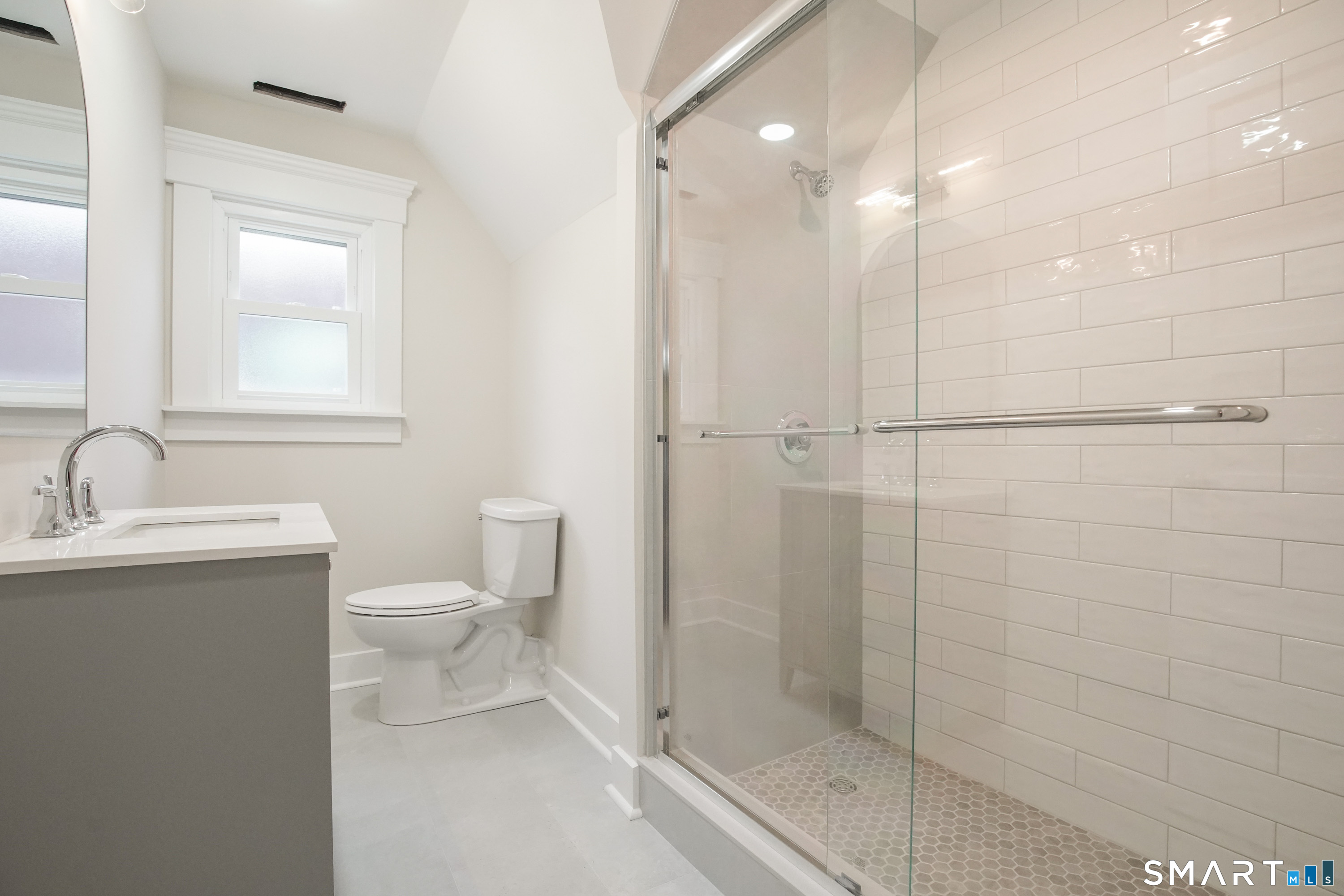 56 Pendleton Street, Unit 3 New Haven, CT 06511 - Photo 13 of 20 a bathroom with a toilet sink and shower