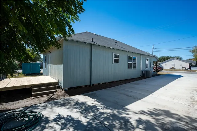 a view of a backyard of a house