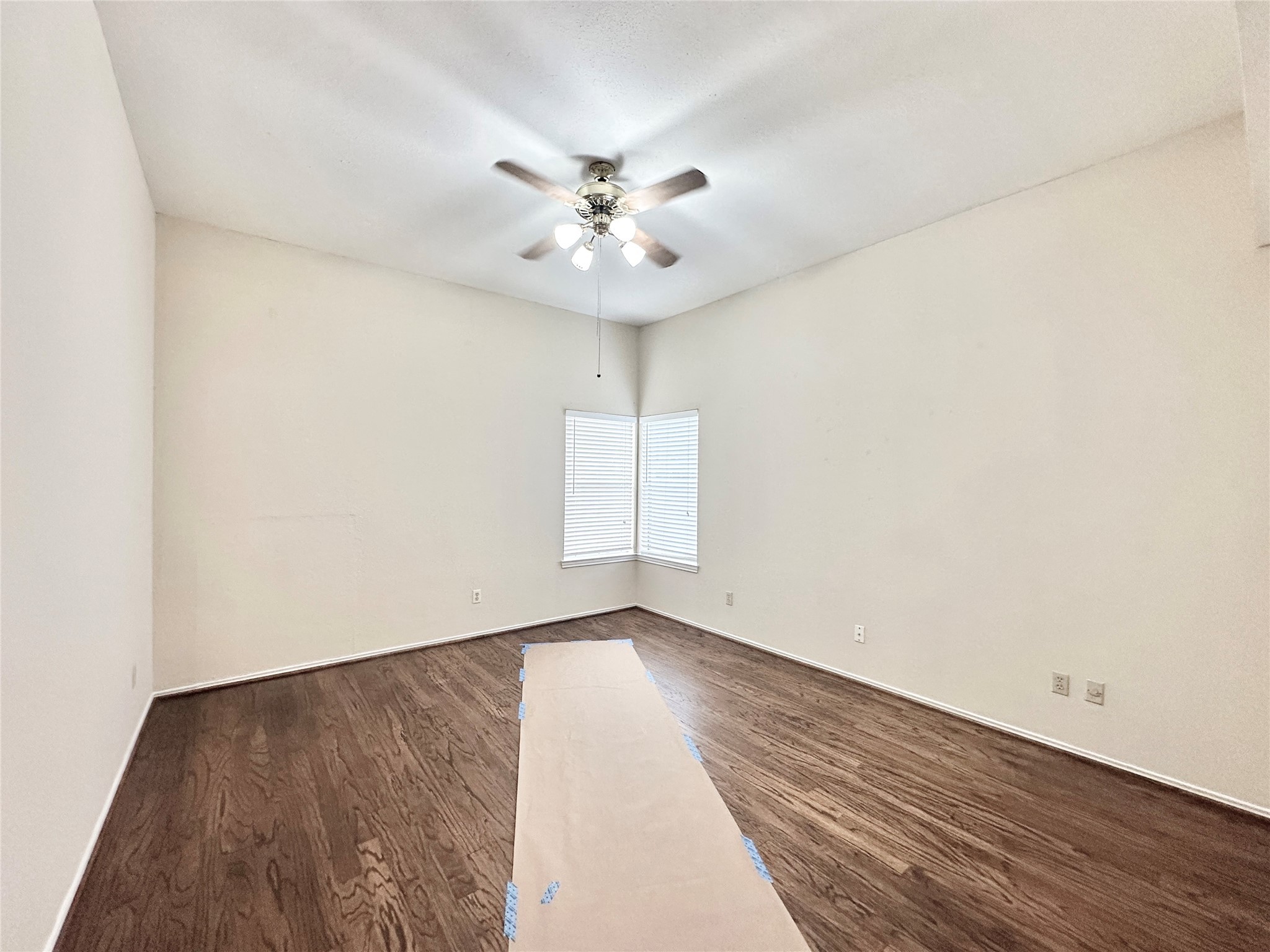16827 Ashbridge Court Spring, TX 77379 - Photo 11 of 22 wooden floor in an empty room with a window