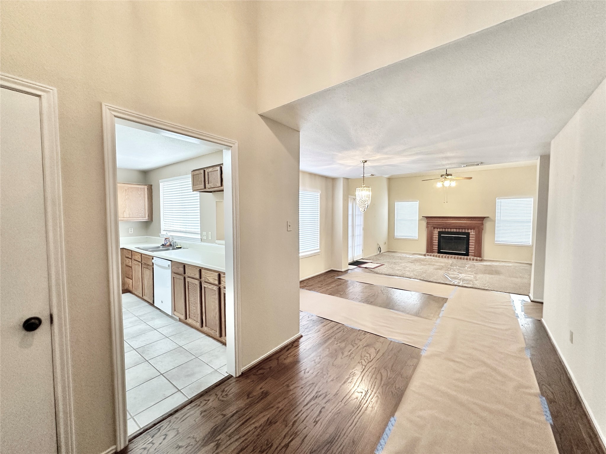 16827 Ashbridge Court Spring, TX 77379 - Photo 4 of 22 a view of living room with a fireplace and wooden floor