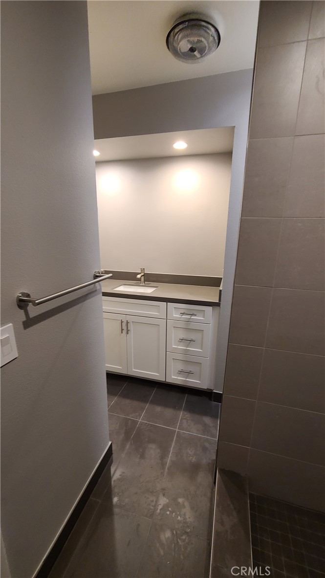 215 Lower Cliff Drive, Unit B Laguna Beach, CA 92651 - Photo 12 of 17 a view of a storage and utility room with washer and dryer