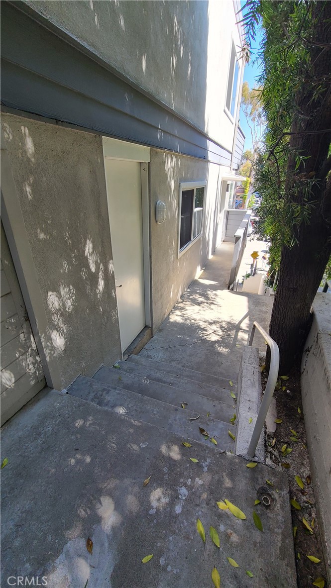 215 Lower Cliff Drive, Unit B Laguna Beach, CA 92651 - Photo 16 of 17 a view of a porch of a house