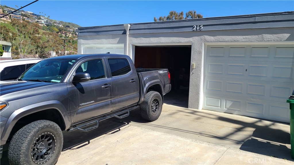 215 Lower Cliff Drive, Unit B Laguna Beach, CA 92651 - Photo 17 of 17 a view of a utility room with washer and dryer