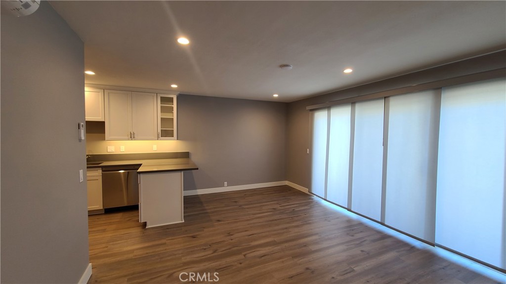 215 Lower Cliff Drive, Unit B Laguna Beach, CA 92651 - Photo 4 of 17 a view of a kitchen with a sink and microwave