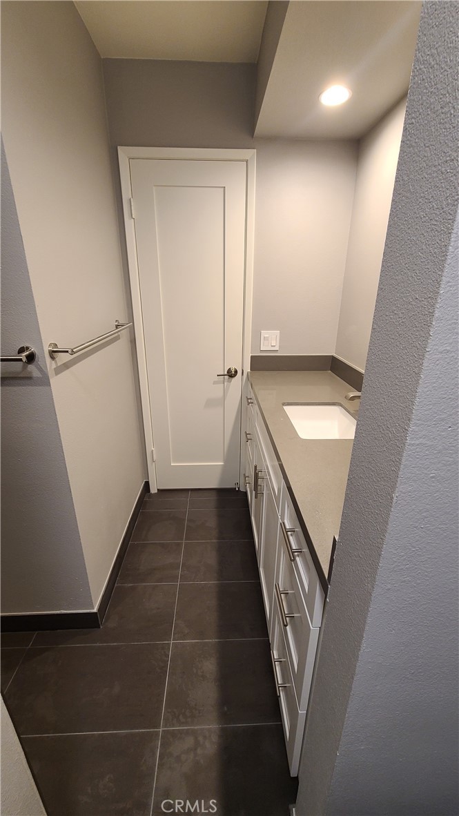215 Lower Cliff Drive, Unit B Laguna Beach, CA 92651 - Photo 10 of 17 a view of a hallway with stairs