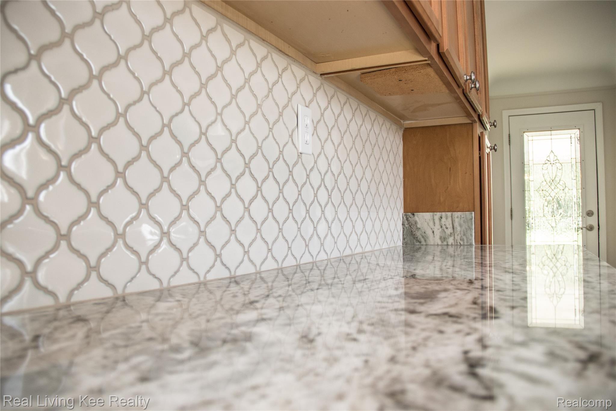 16475 Almont Road Allenton, MI 48002 - Photo 22 of 43 Kitchen backsplash.jpg