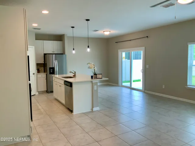 a bathroom with a toilet and a sink