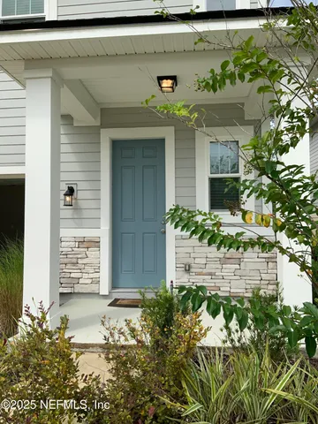a kitchen with stainless steel appliances a refrigerator and a sink