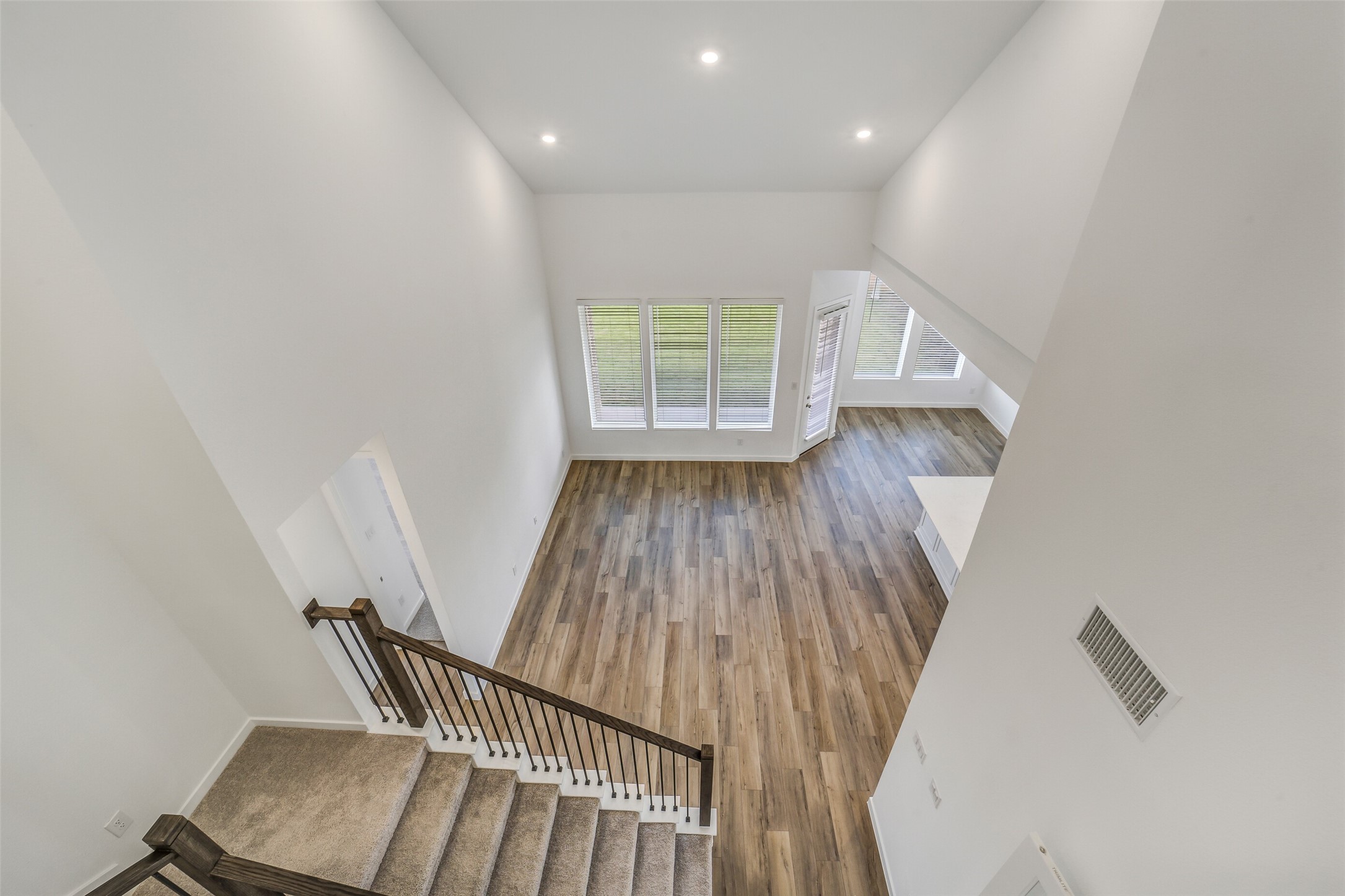 31111 Marlow Mnr Court Fulshear, TX 77441 - Photo 25 of 34 a view of wooden floor in a room