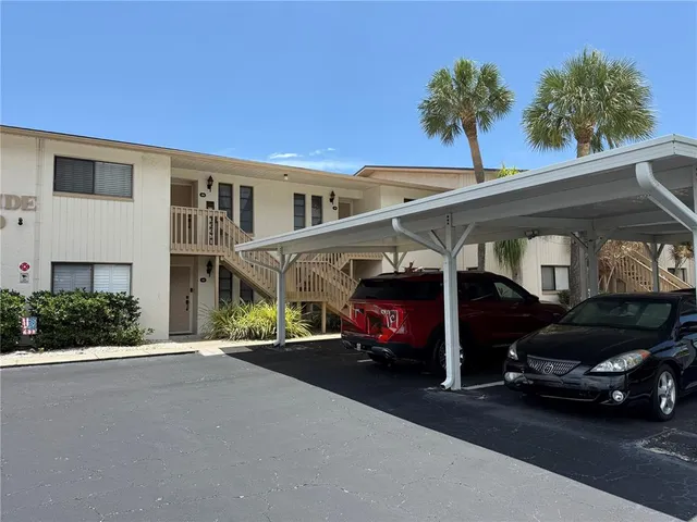 a car parked in front of a house
