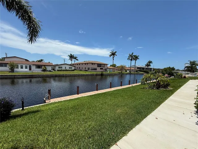 a view of a lake with a house