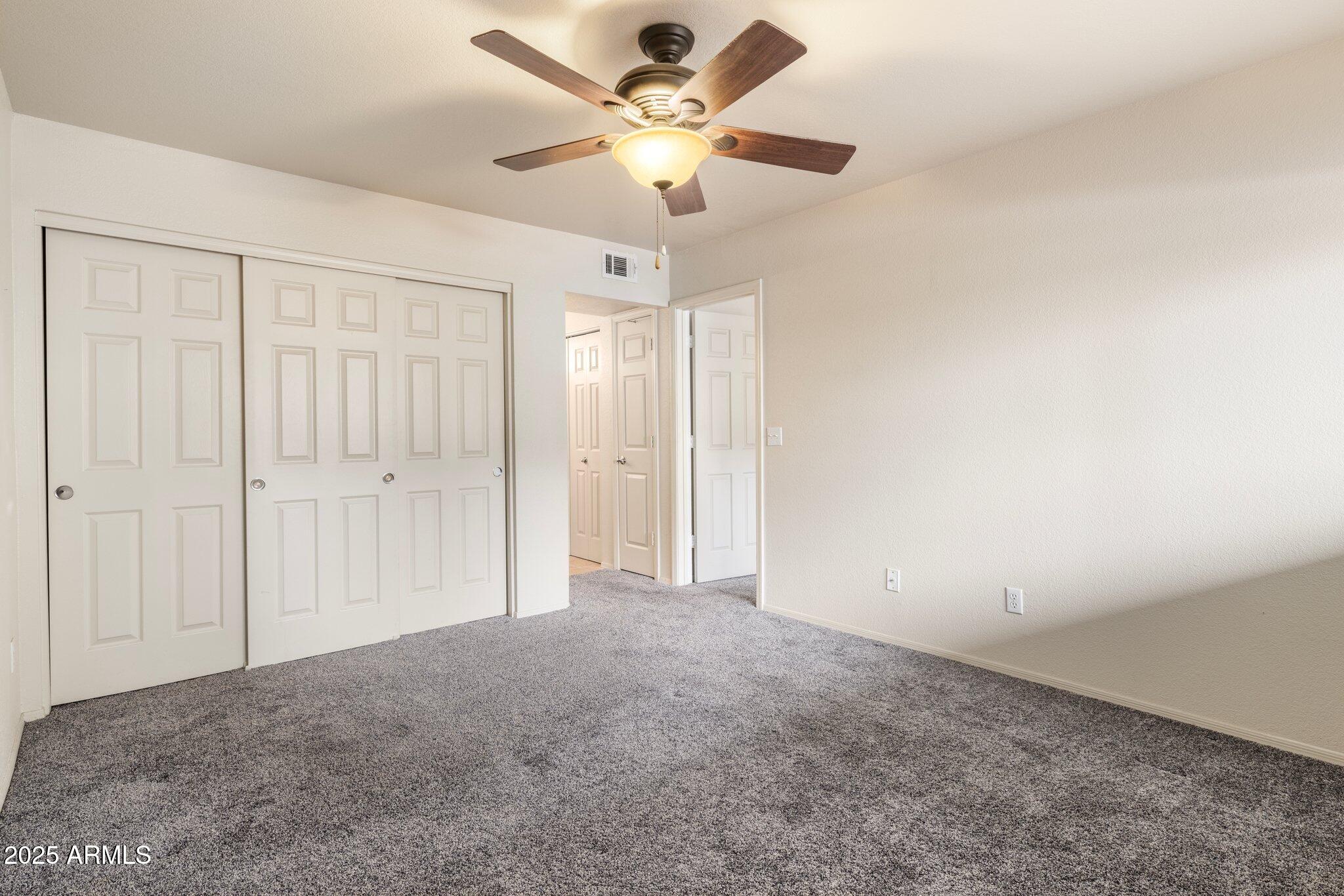 1331 West Baseline Road, Unit 137 Mesa, AZ 85202 - Photo 13 of 26 Primary Bedroom 1