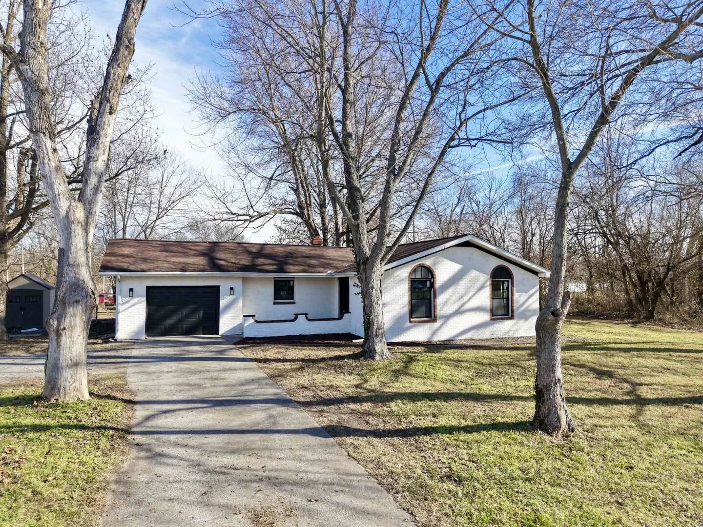 208 North Brown Street Benton, IL 62812 - Photo 13 of 31 a view of a house with a yard covered in snow