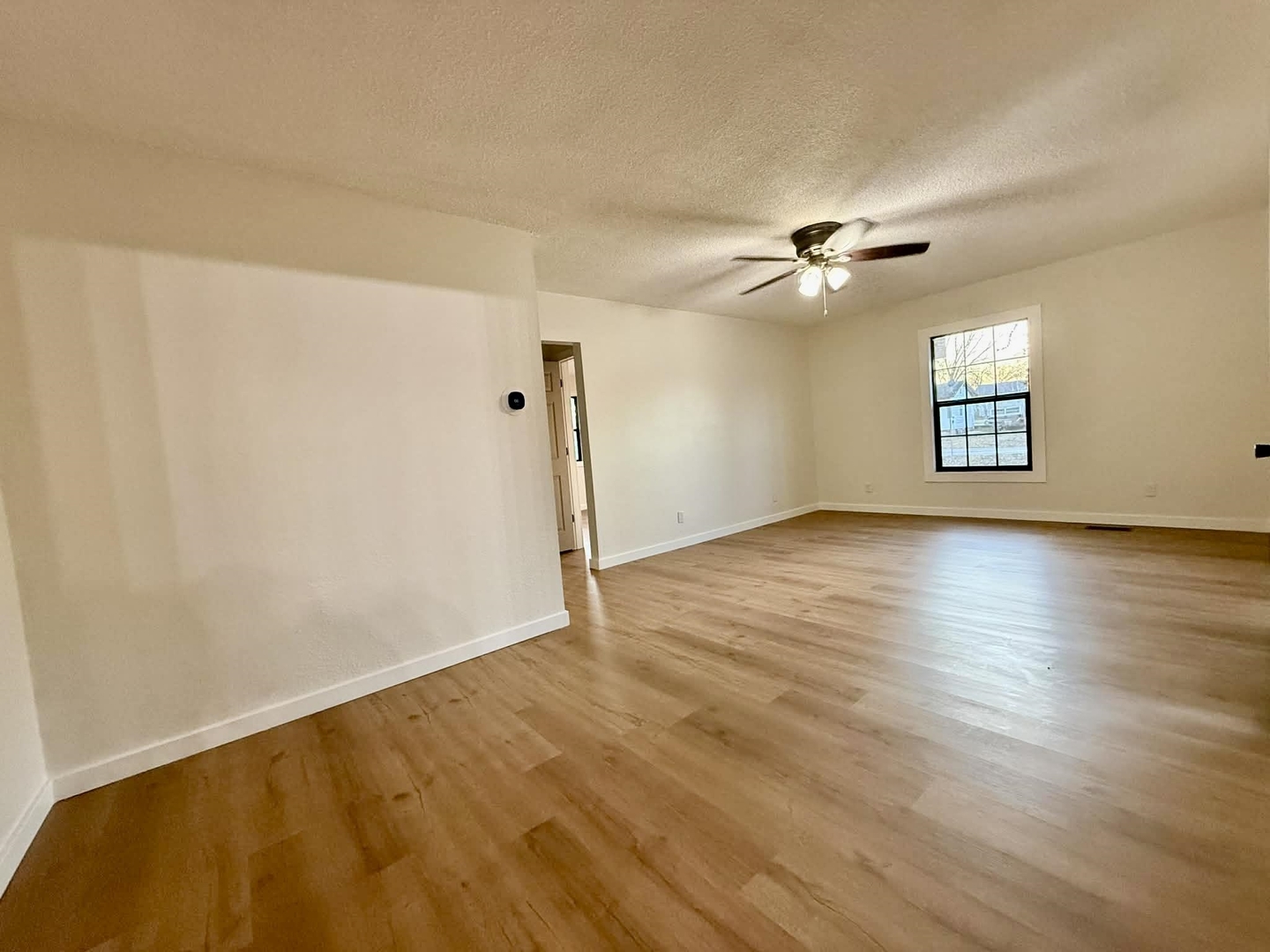 208 North Brown Street Benton, IL 62812 - Photo 18 of 31 wooden floor in an empty room with a window