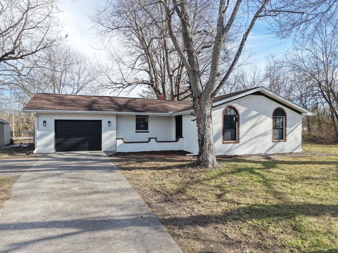 208 North Brown Street Benton, IL 62812 - Photo 2 of 31 a view of a house with a large tree