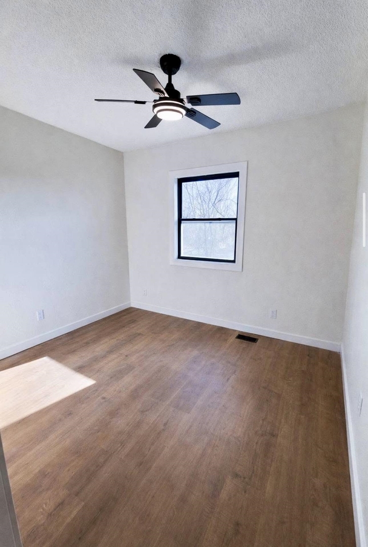 208 North Brown Street Benton, IL 62812 - Photo 24 of 31 a view of a room with a ceiling fan