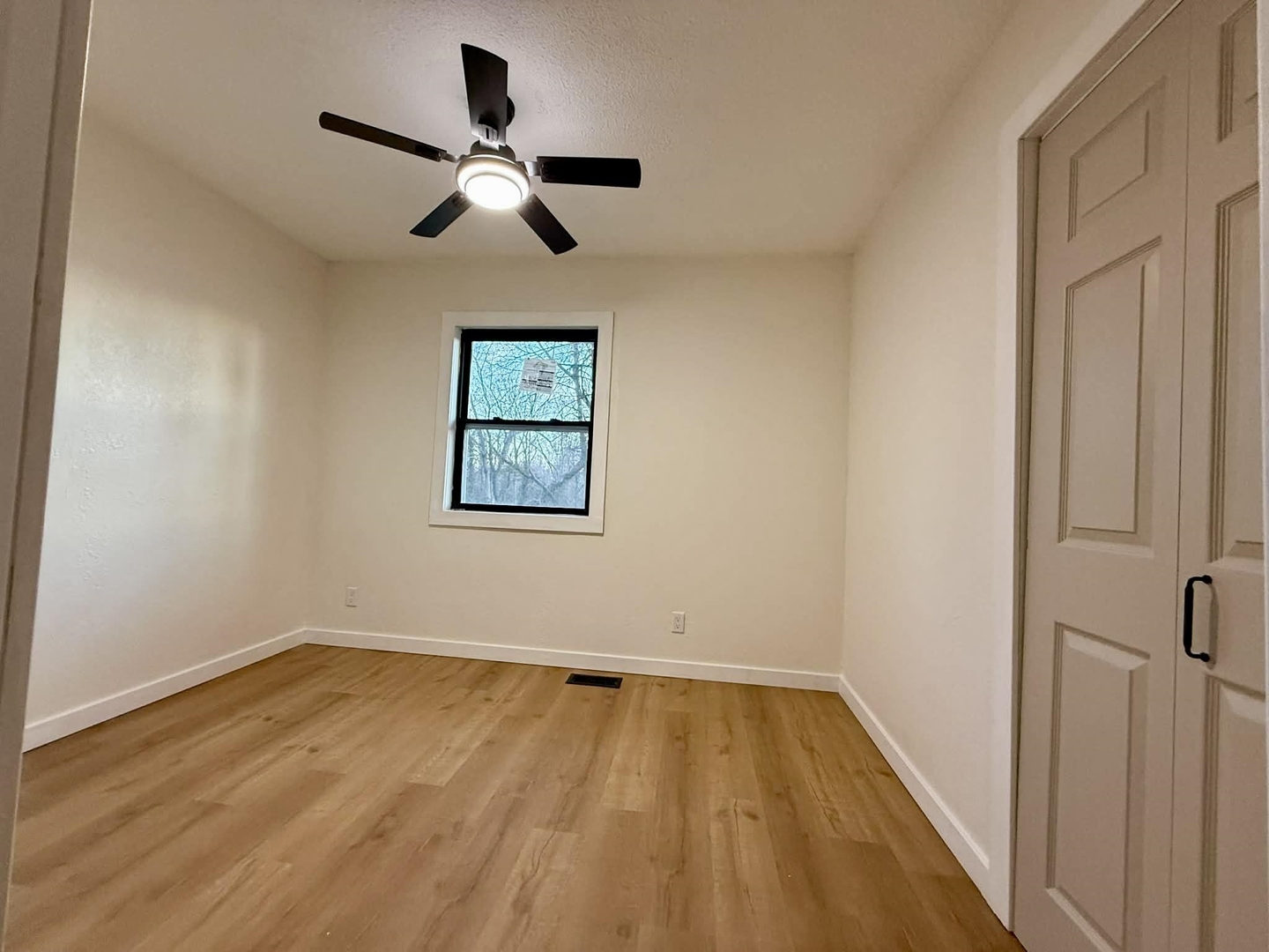 208 North Brown Street Benton, IL 62812 - Photo 28 of 31 a view of empty room with wooden floor