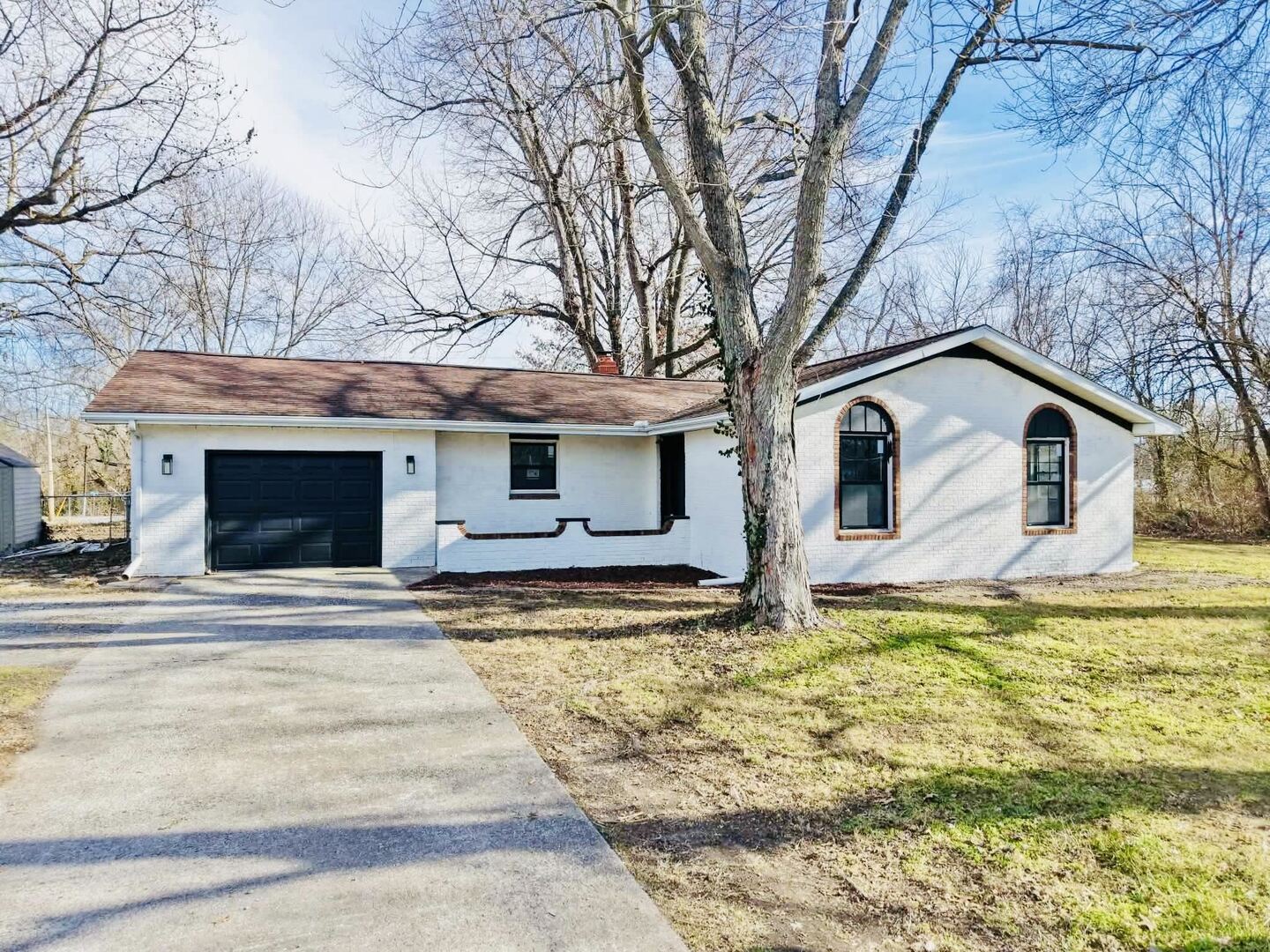 208 North Brown Street Benton, IL 62812 - Photo 3 of 31 a view of a house with snow on the tree