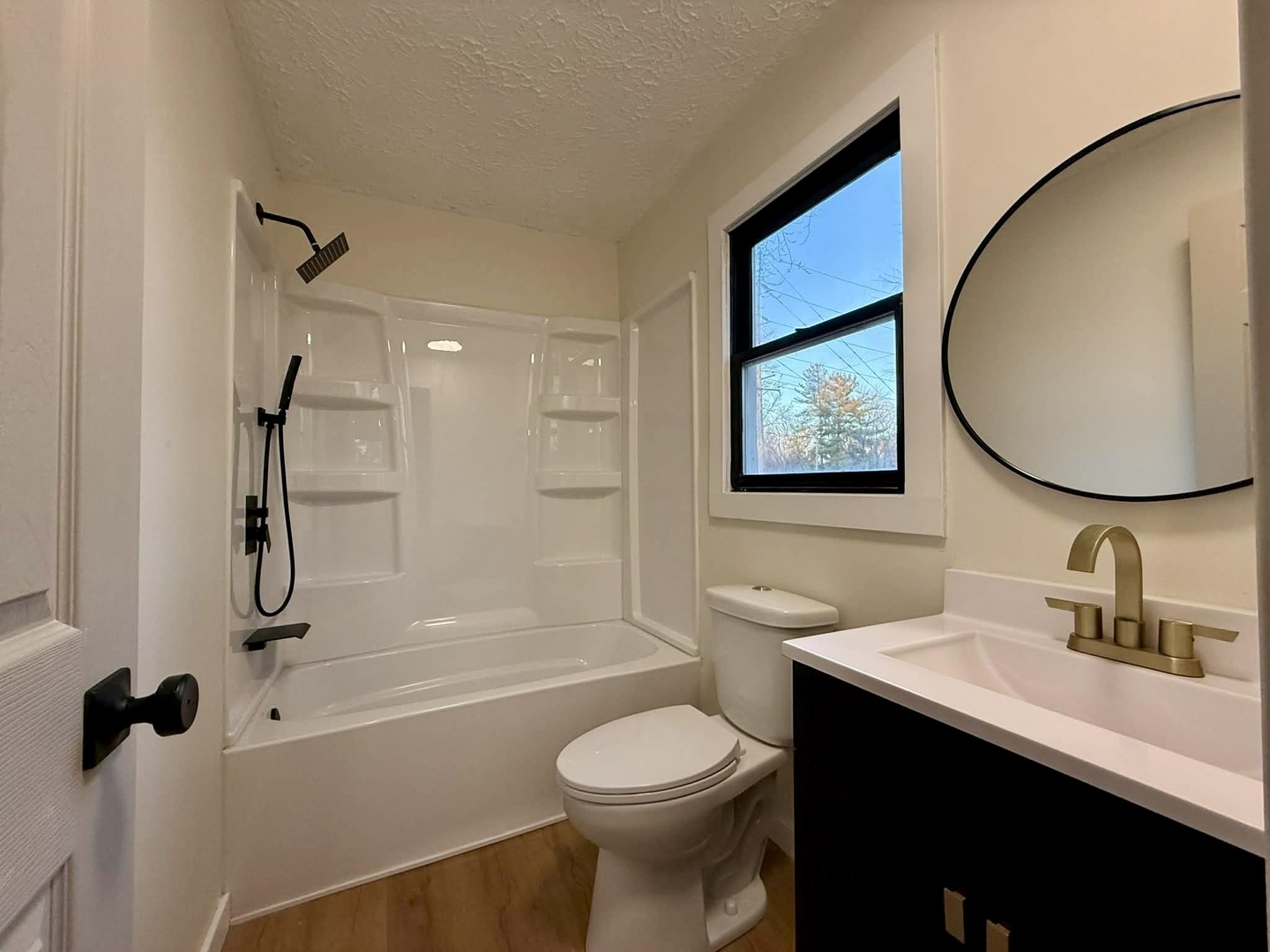 208 North Brown Street Benton, IL 62812 - Photo 31 of 31 a bathroom with a sink a toilet and shower