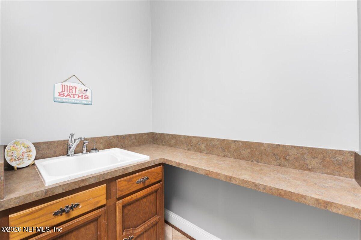 3568 Stratton Road Jacksonville, FL 32221 - Photo 51 of 67 laundry room w/sink