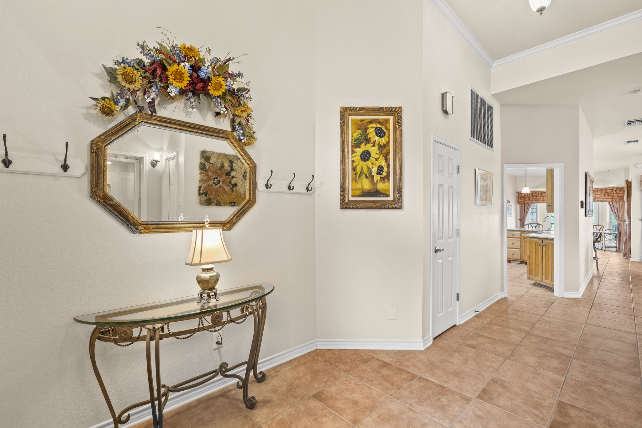 1427 River Ridge Ranch Road Killeen, TX 76549 - Photo 7 of 40 A welcoming entryway with elegant crown molding and durable tile flooring leading into the home's inviting interior.