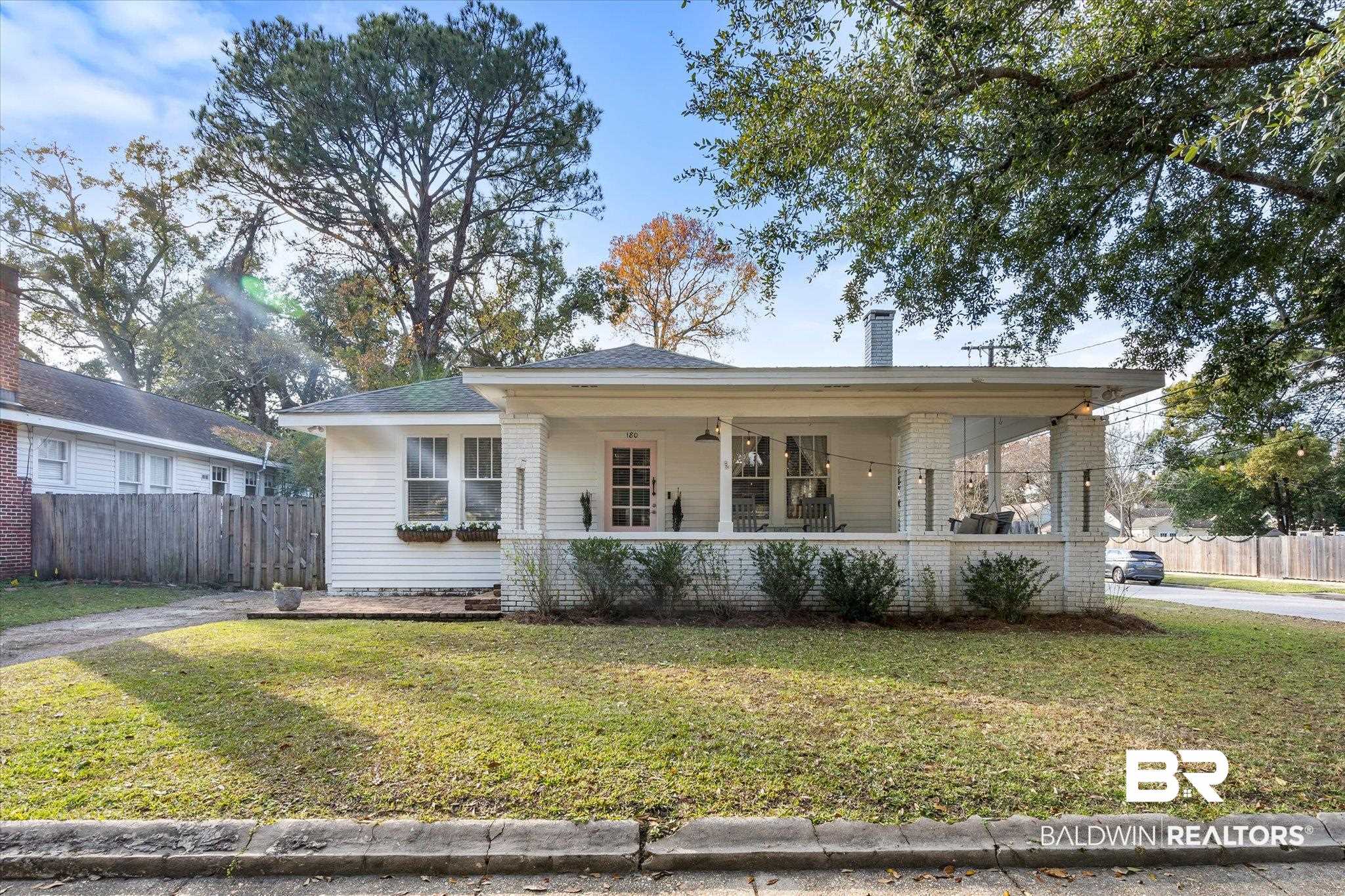 180 Williams Street Mobile, AL 36606 - Photo 1 of 20 View of front of home featuring a porch and a front lawn