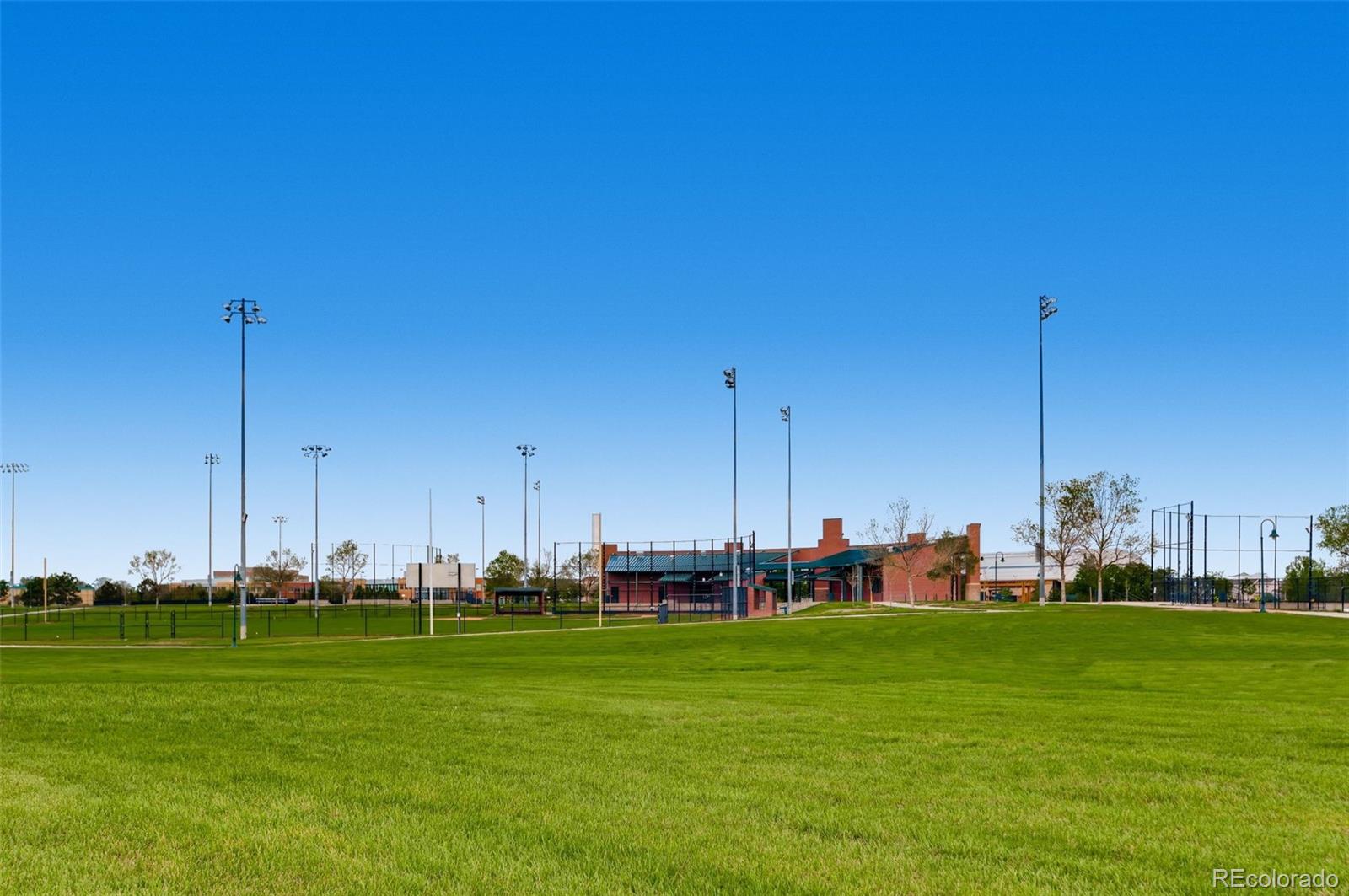 85 Uinta Way, Unit 106 Denver, CO 80230 - Photo 40 of 42 a view of a golf course with chairs