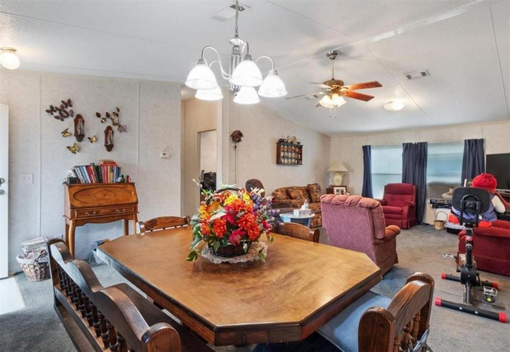 7141 County Road 1050 Celeste, TX 75423 - Photo 21 of 32 a view of a dining room with furniture