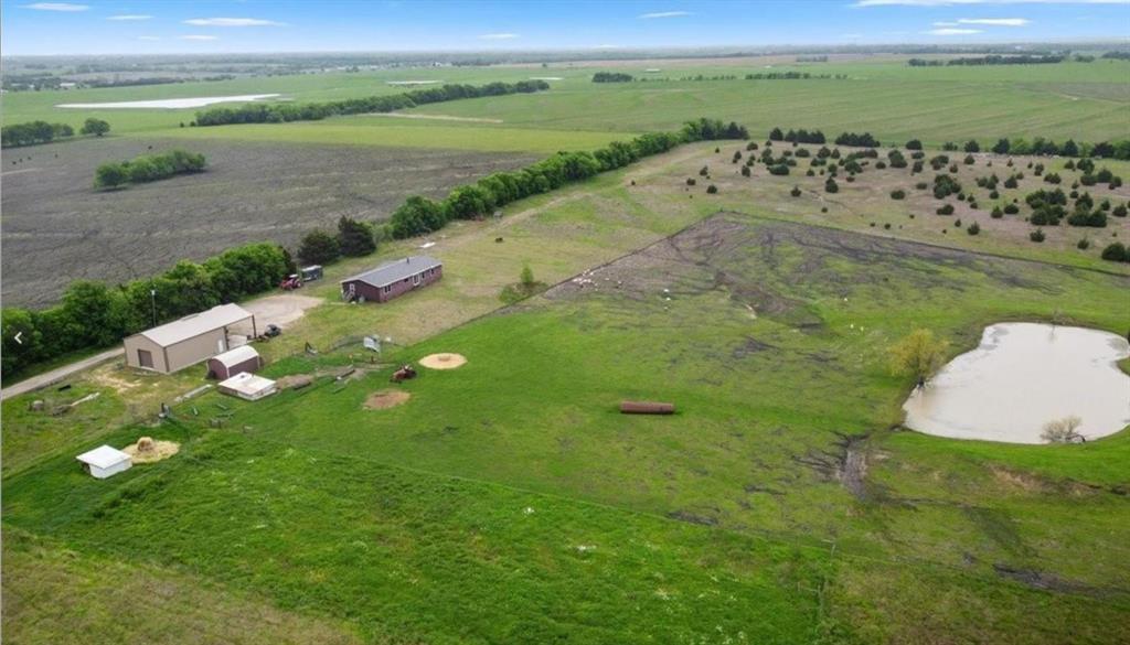 7141 County Road 1050 Celeste, TX 75423 - Photo 25 of 32 a view of a lake with a big yard