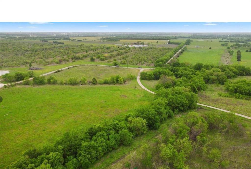 7141 County Road 1050 Celeste, TX 75423 - Photo 30 of 32 a view of a field with an ocean