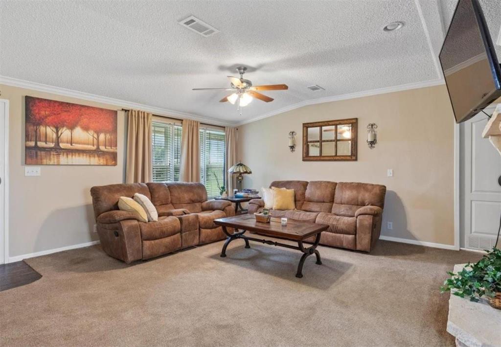7141 County Road 1050 Celeste, TX 75423 - Photo 10 of 32 a living room with furniture and a large window