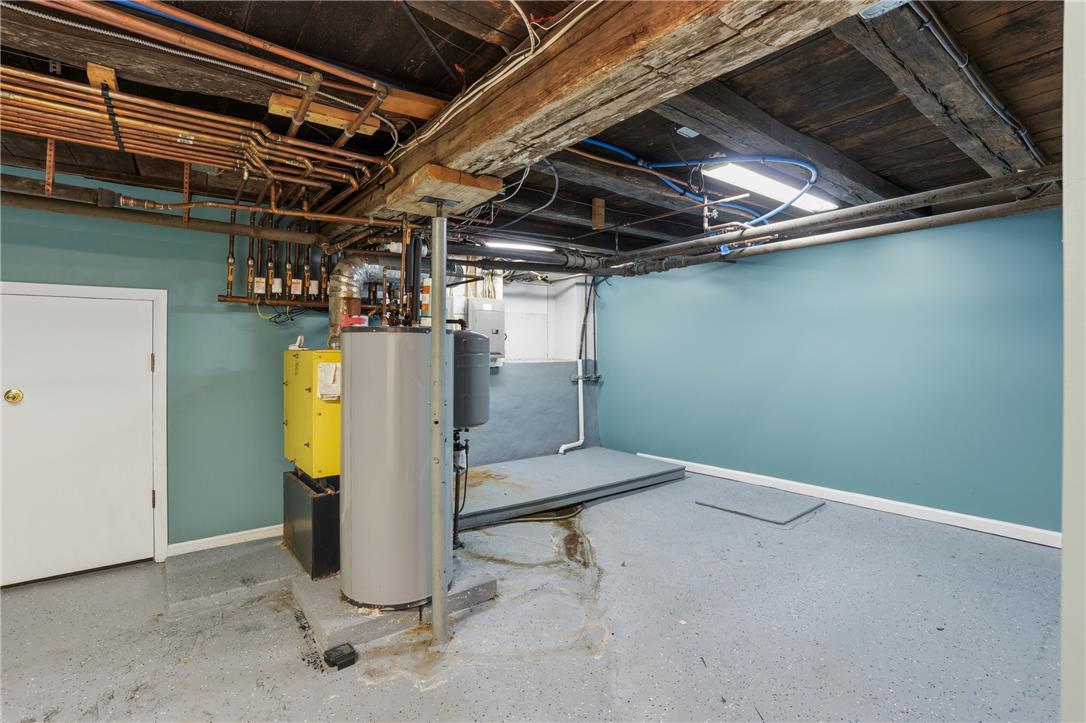 6271 Batman Road Zionsville, PA 18092 - Photo 77 of 100 A well-lit unfinished basement offers ample utility space.
