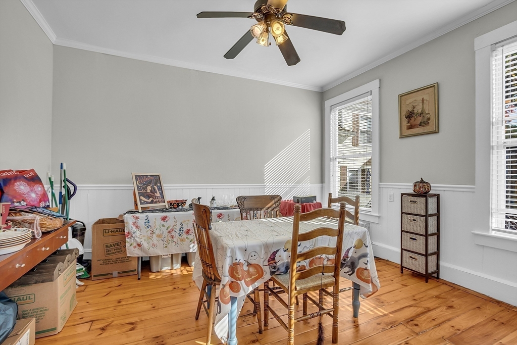 276 Pine Street Lowell, MA 01851 - Photo 12 of 42 a view of a livingroom with furniture and a window