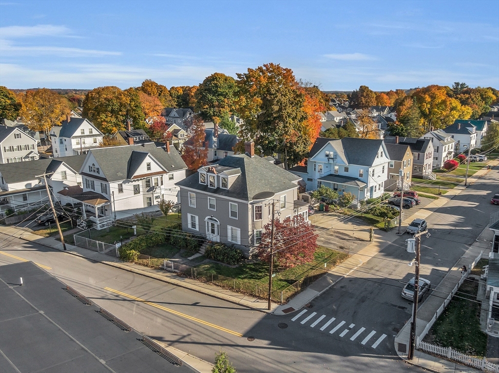 276 Pine Street Lowell, MA 01851 - Photo 3 of 42 an aerial view of multiple houses