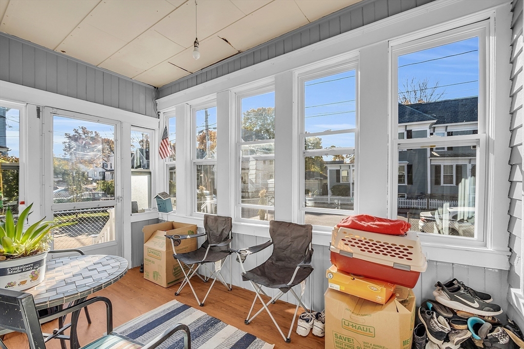 276 Pine Street Lowell, MA 01851 - Photo 37 of 42 a living room with furniture and a window