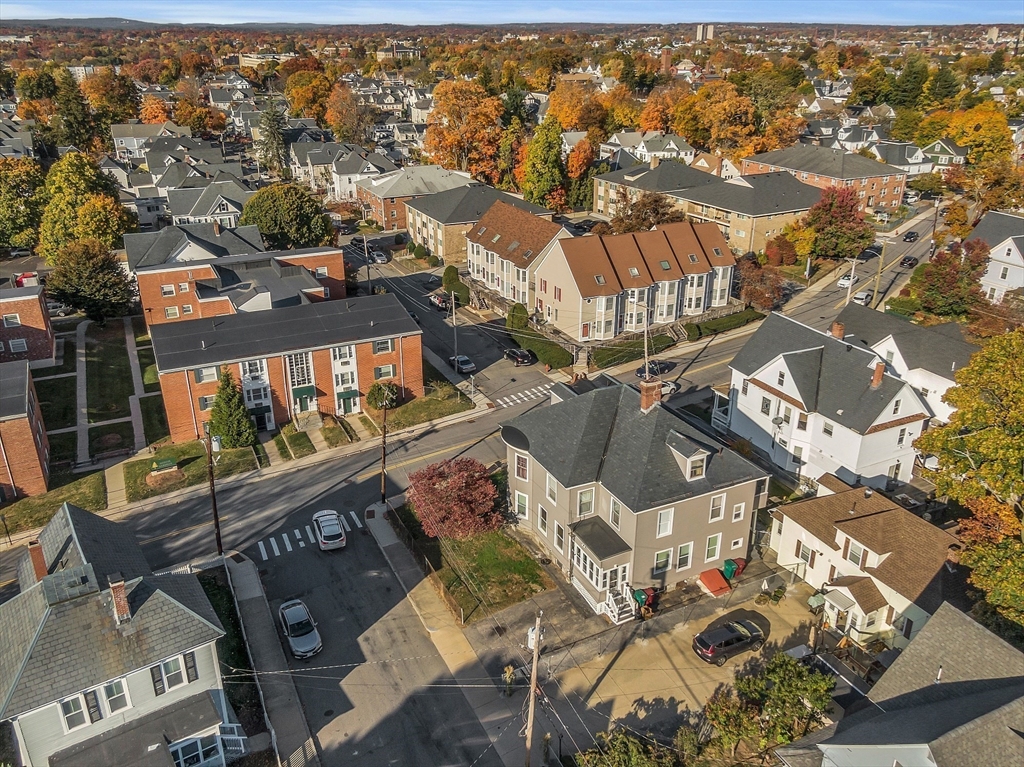 276 Pine Street Lowell, MA 01851 - Photo 38 of 42 an aerial view of a house with a ocean view