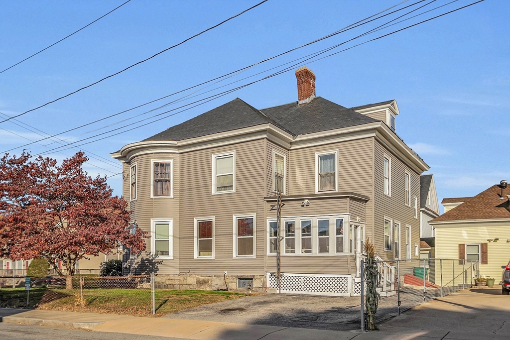 276 Pine Street Lowell, MA 01851 - Photo 4 of 42 a front view of a house