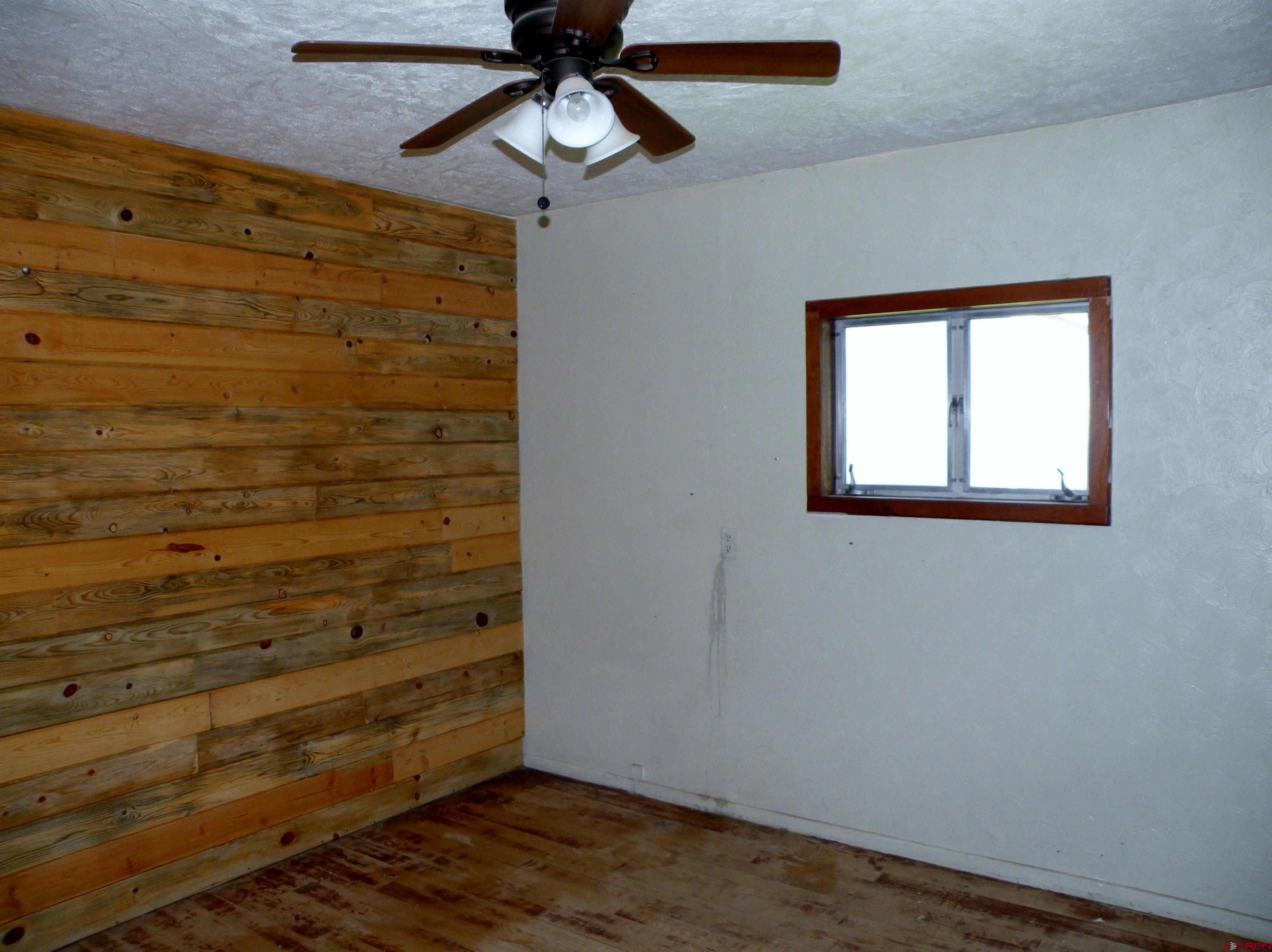27793 BB Road Nucla, CO 81424 - Photo 15 of 18 wooden floor in an empty room