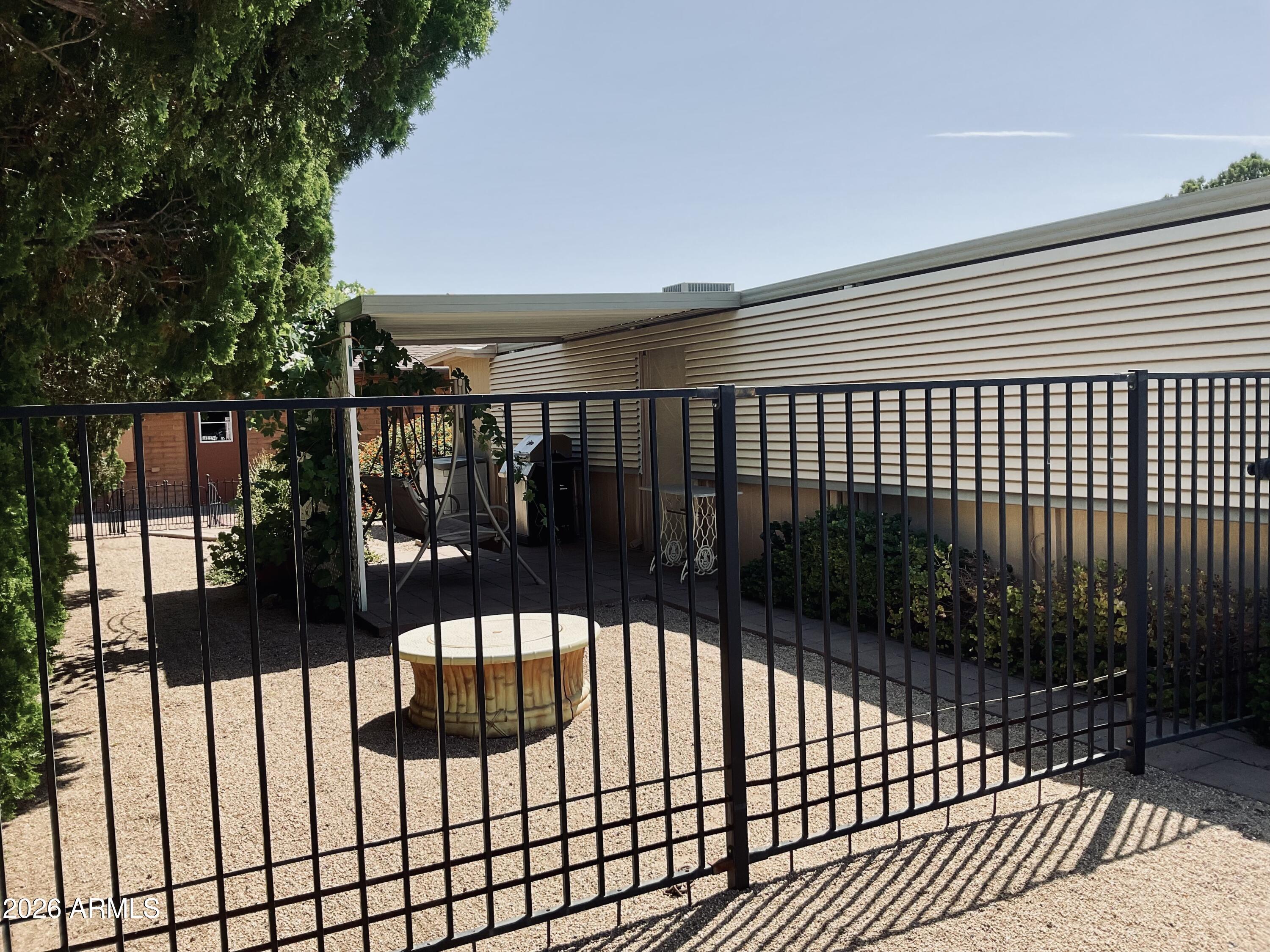 3036 East Utopia Road, Unit 52 Phoenix, AZ 85050 - Photo 24 of 36 Side Yard Area