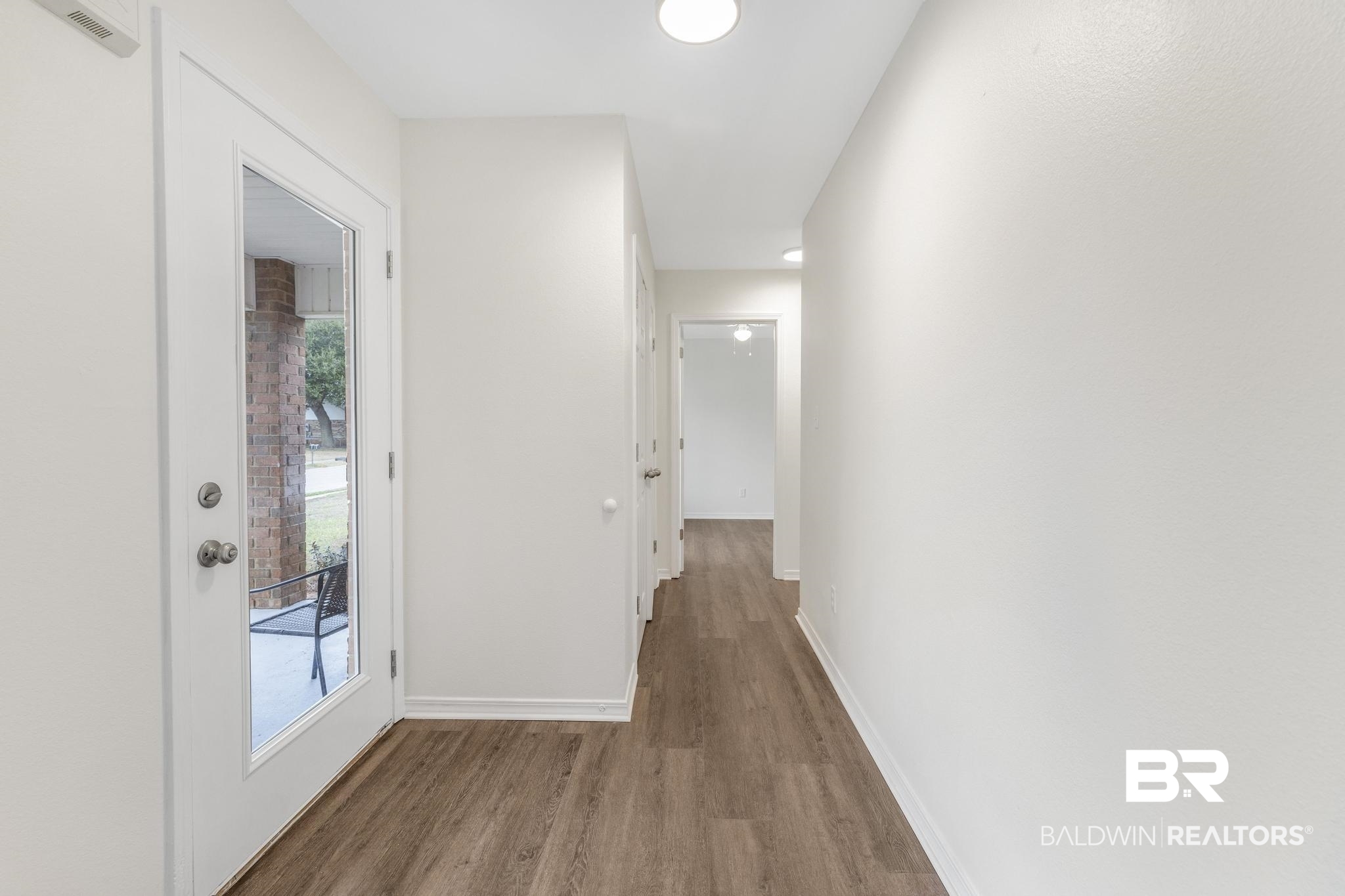16330 Absalom Street Foley, AL 36535 - Photo 25 of 42 Hallway with light hardwood / wood-style floors