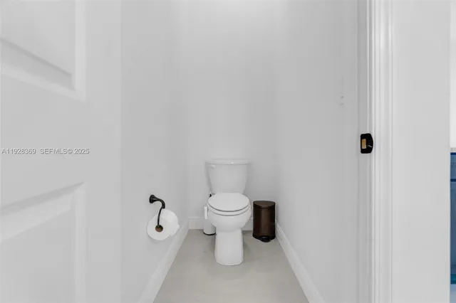 a bathroom with a granite countertop shower a sink and a mirror