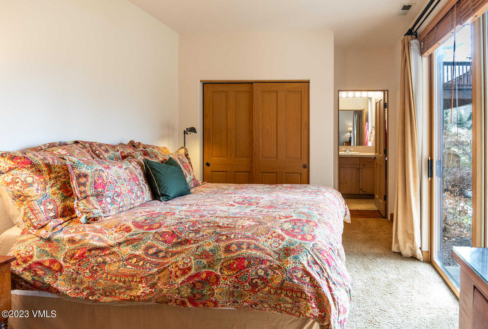 306 Hackamore Road, Unit A Edwards, CO 81632 - Photo 22 of 27 a bedroom with a bed and a window