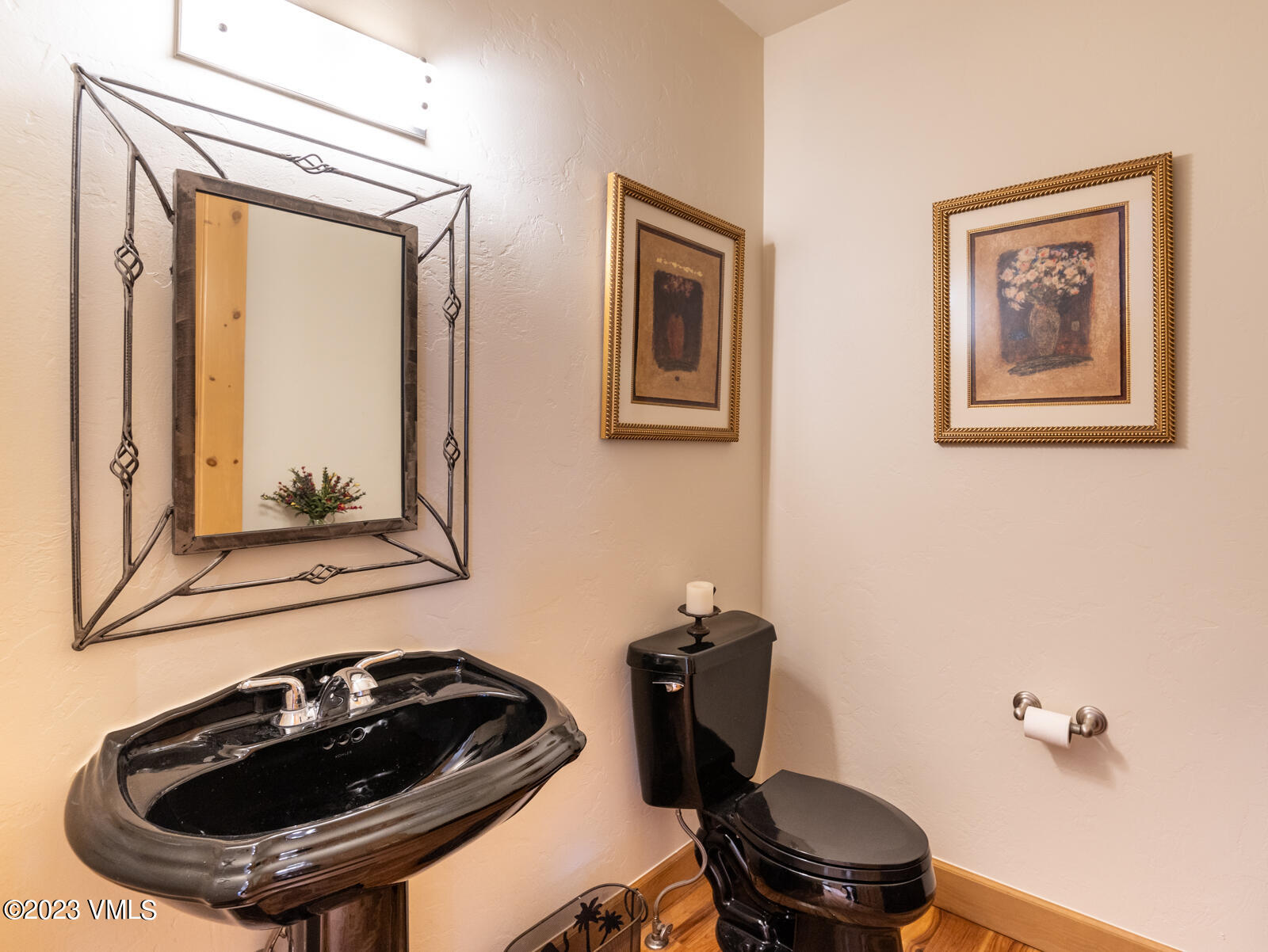 306 Hackamore Road, Unit A Edwards, CO 81632 - Photo 5 of 27 a bathroom with a sink a toilet and mirror