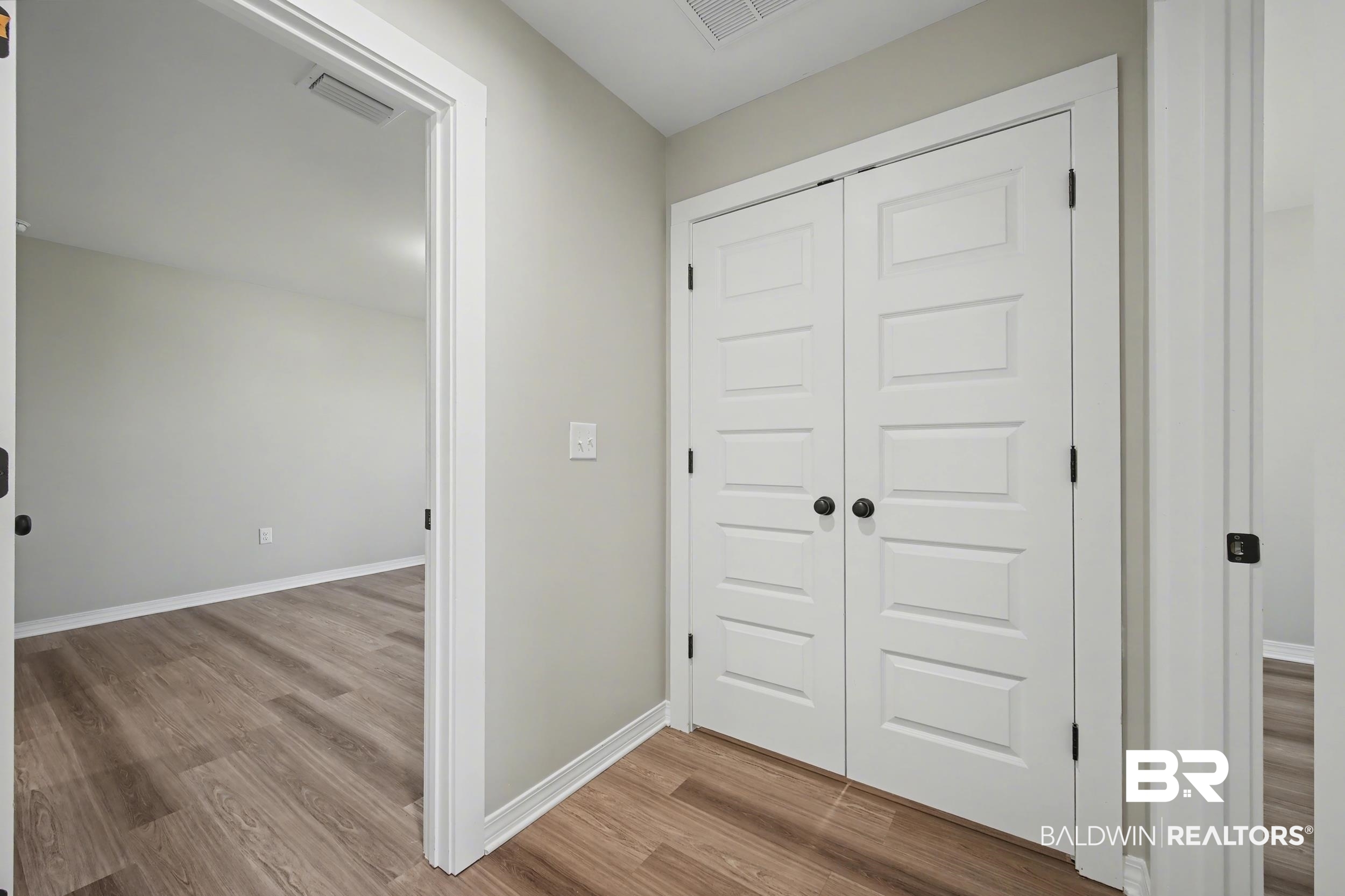 76 Fincher Lane Loxley, AL 36551 - Photo 25 of 33 Foyer featuring light wood-style flooring and baseboards