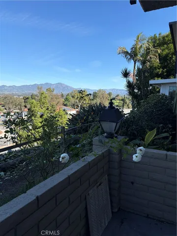 a view of a terrace with a garden