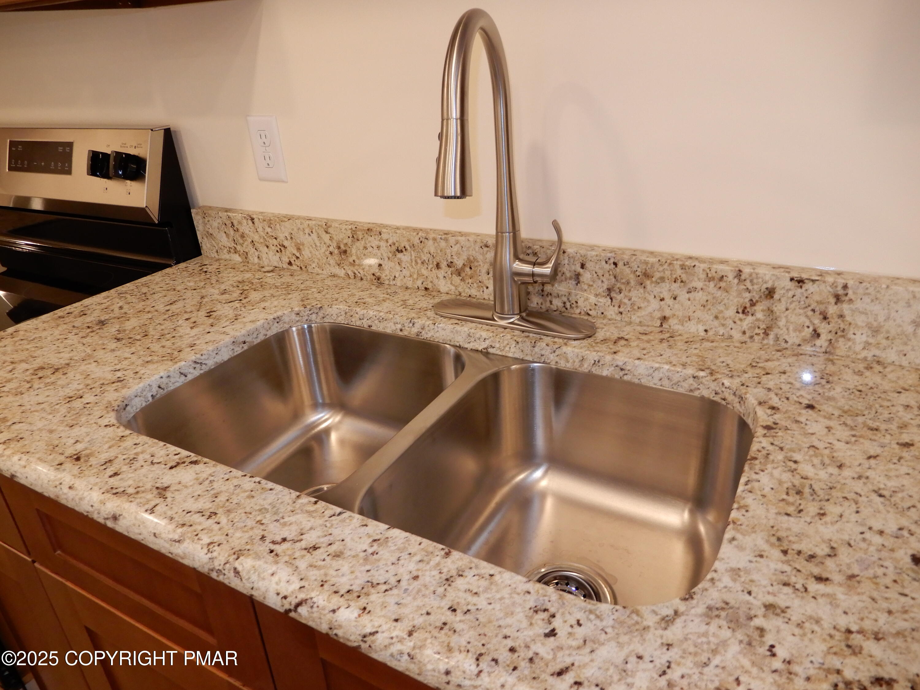 101 Brook Village Scotrun, PA 18355 - Photo 12 of 18 a kitchen with a sink and a stove top oven