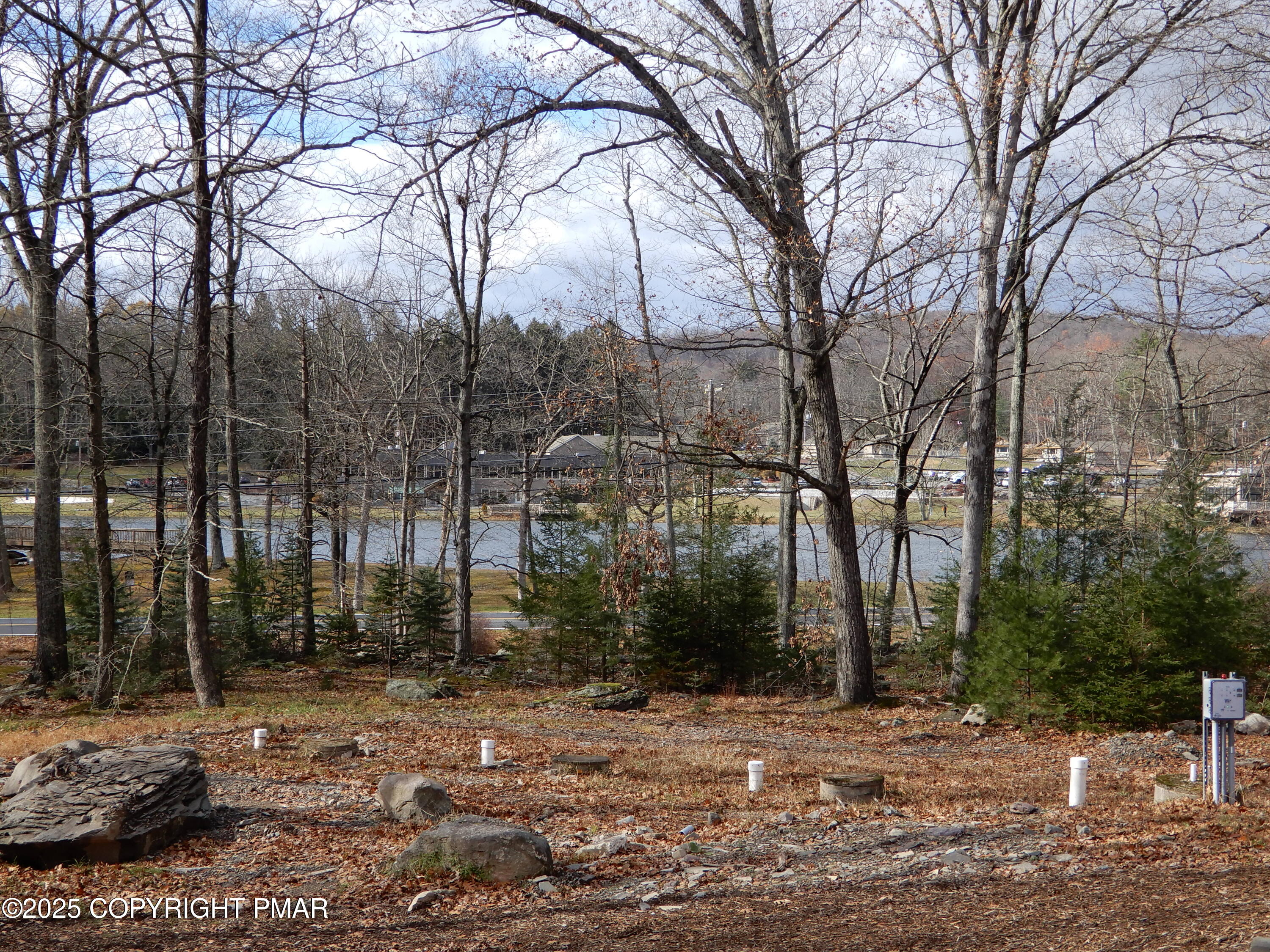 101 Brook Village Scotrun, PA 18355 - Photo 4 of 18 a backyard of a house with lots of green space