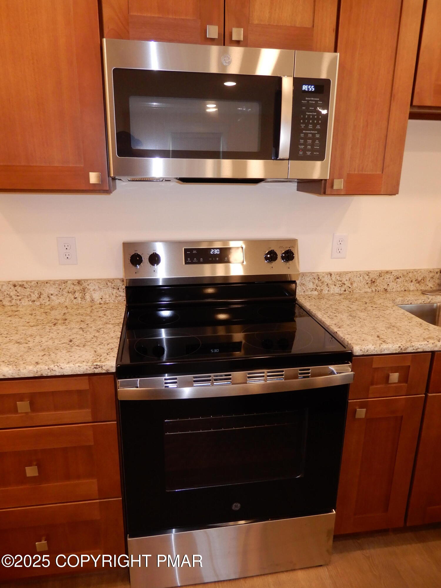101 Brook Village Scotrun, PA 18355 - Photo 10 of 18 a stove top oven sitting inside of a kitchen